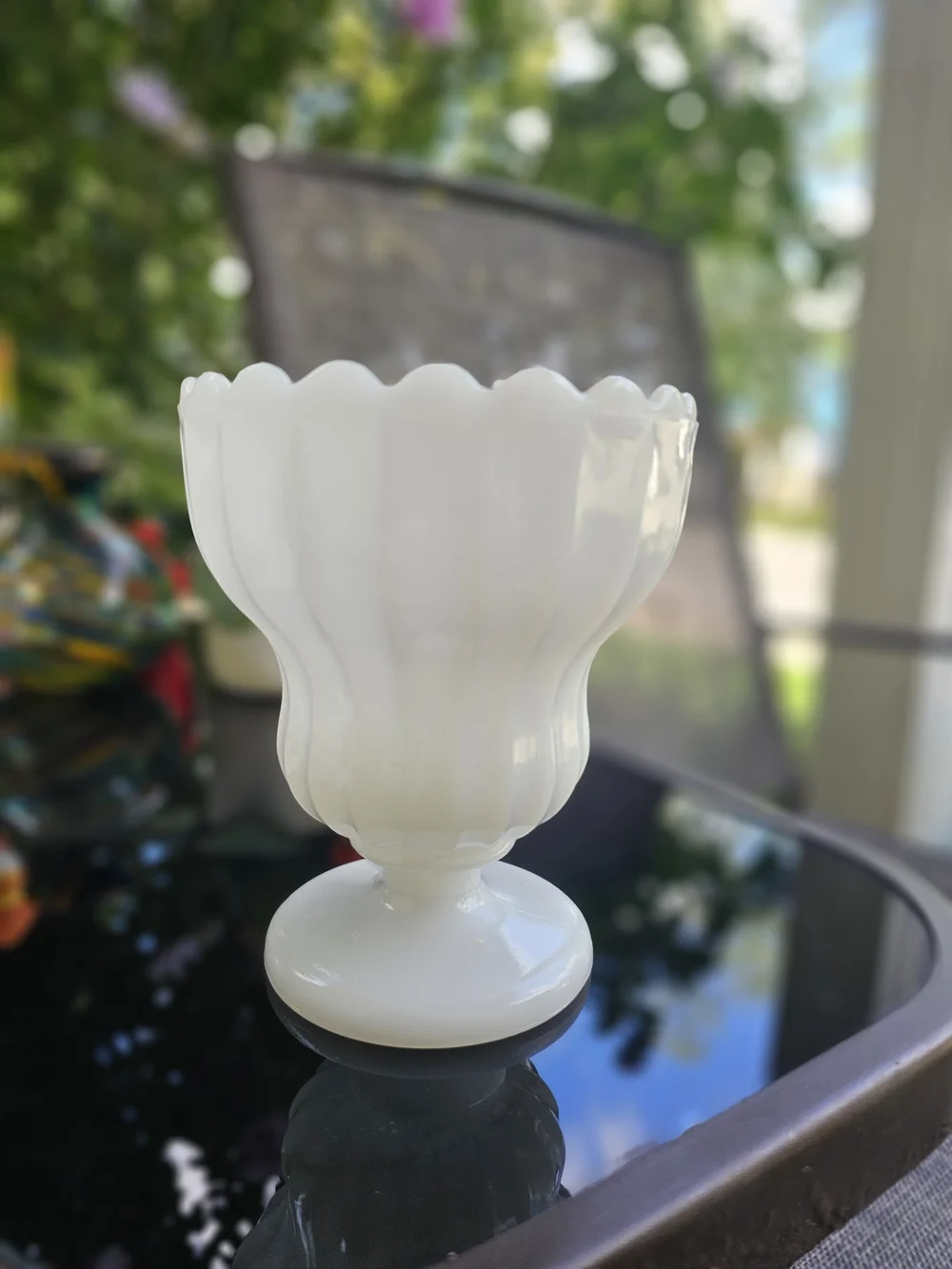 Vintage E.O. Brody white milk glass footed urn planter featuring a fluted body